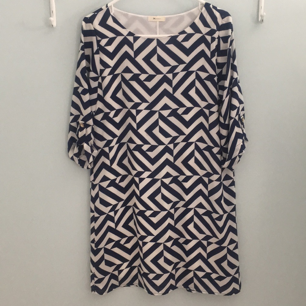 Slip on sheath dress with sleeve detail.